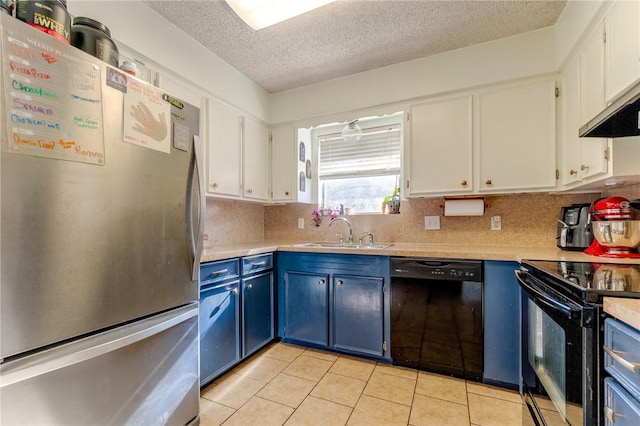 kitchen featuring black appliances, white cabinetry, sink, light tile patterned flooring, and blue cabinets