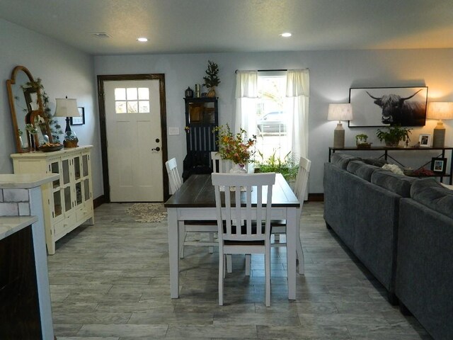 2545 Poinsetta Pl, Ingleside, TX 78362 - dining space with healthy amount of natural light, recessed lighting, and wood finished floors