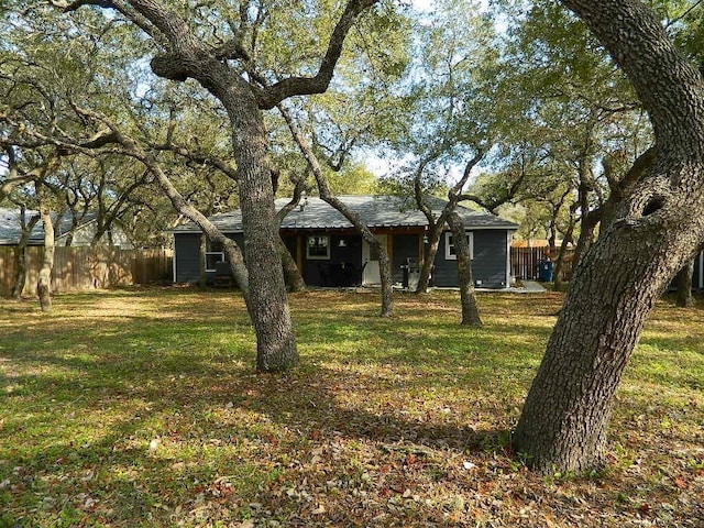 exterior space with a front yard