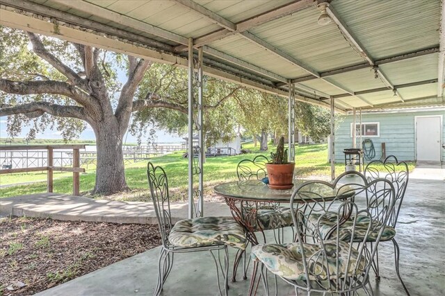 195 Carmel Dr, Sandia, TX 78383 - view of patio / terrace with a water view