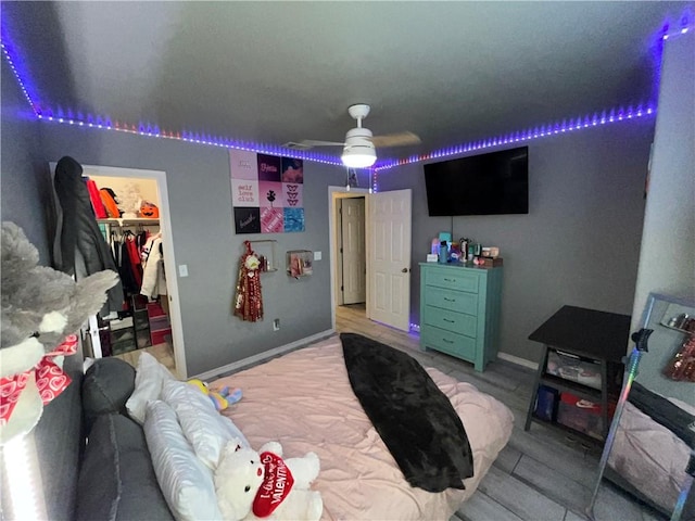 7305 Russ, Corpus Christi, TX 78414 - bedroom with a walk in closet, a closet, and ceiling fan