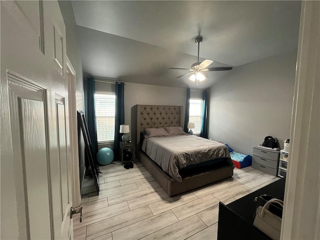 7305 Russ, Corpus Christi, TX 78414 - bedroom with multiple windows, wood finish floors, lofted ceiling, and ceiling fan