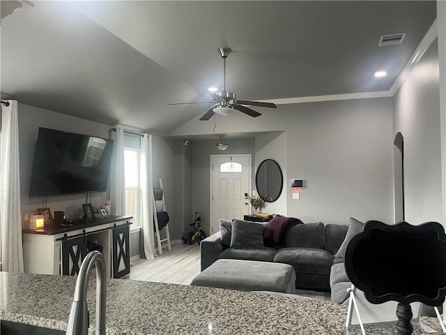 7305 Russ, Corpus Christi, TX 78414 - living room with a ceiling fan, light wood finished floors, and crown molding