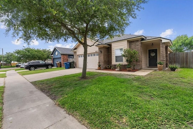 6517 Marblewing Dr, Corpus Christi, TX 78414 - single story home with driveway, an attached garage, and brick siding