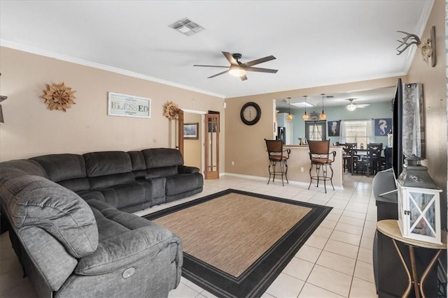 6517 Marblewing Dr, Corpus Christi, TX 78414 - living area featuring ceiling fan, light tile patterned flooring, crown molding, and baseboards