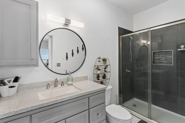 6517 Marblewing Dr, Corpus Christi, TX 78414 - full bathroom featuring vanity, toilet, and a stall shower