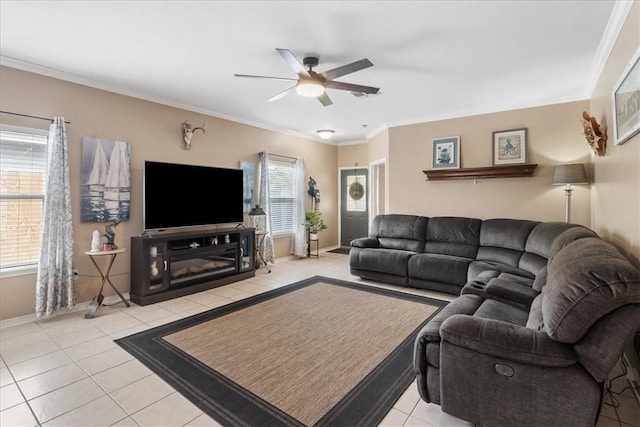 6517 Marblewing Dr, Corpus Christi, TX 78414 - living room with light tile patterned floors, a ceiling fan, baseboards, and crown molding