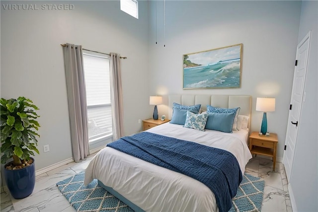 bedroom featuring multiple windows