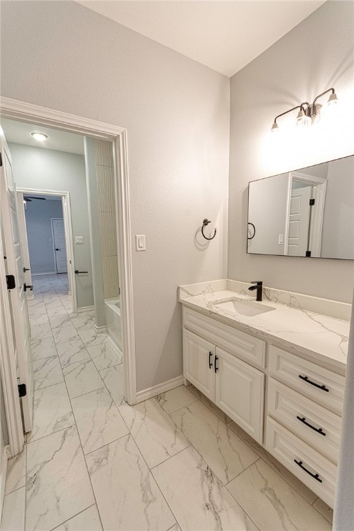 bathroom with vanity and tub / shower combination