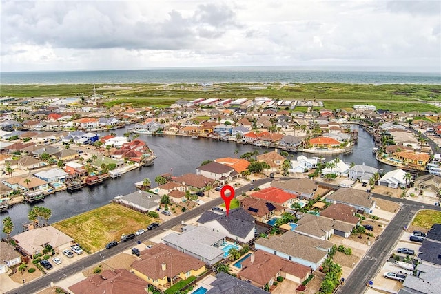 drone / aerial view featuring a water view