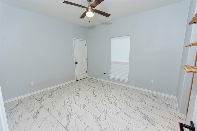 unfurnished room with ceiling fan