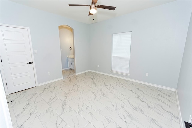 unfurnished room featuring ceiling fan