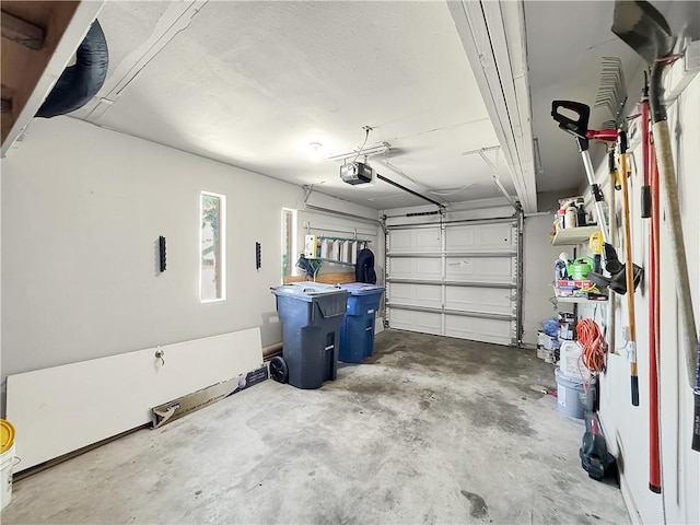 garage featuring a garage door opener