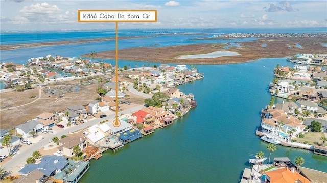 bird's eye view featuring a water view and a residential view