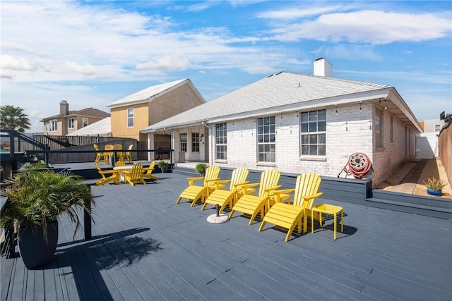 deck featuring a fenced backyard