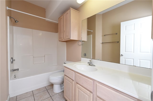 full bathroom with toilet, vanity, tile patterned floors, and bathtub / shower combination