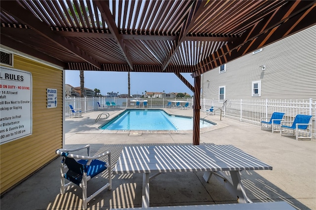 view of pool featuring a pergola and a patio area