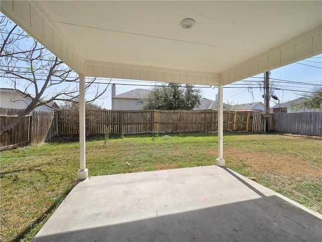 view of yard with a fenced backyard and a patio area