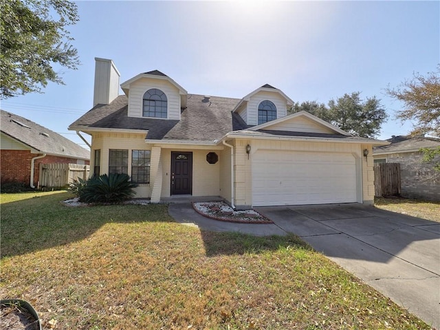 view of front of property with fence, roof with shingles, an attached garage, concrete driveway, and a front lawn