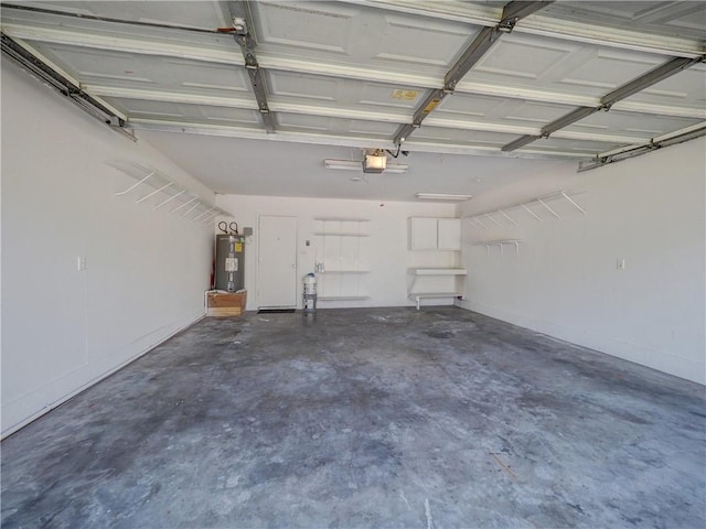 garage featuring a garage door opener and water heater