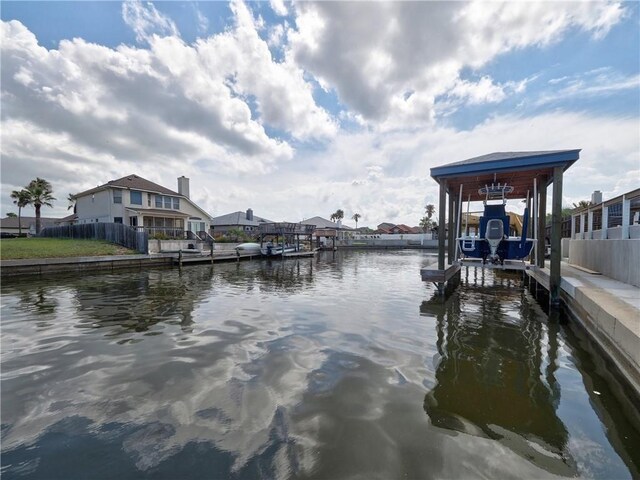 14218 Punta Bonaire Dr, Corpus Christi, TX 78418 - dock area with boat lift and a water view