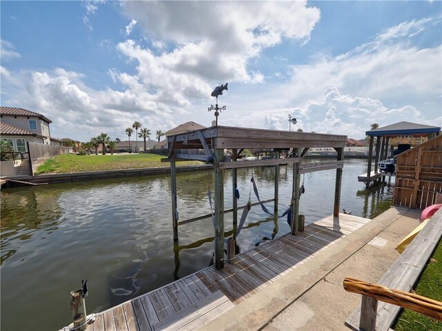 14218 Punta Bonaire Dr, Corpus Christi, TX 78418 - dock area with a water view and boat lift