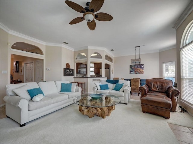 14218 Punta Bonaire Dr, Corpus Christi, TX 78418 - living area with a ceiling fan, ornamental molding, and light colored carpet
