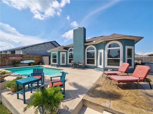 14218 Punta Bonaire Dr, Corpus Christi, TX 78418 - view of swimming pool featuring a fenced backyard and a patio area