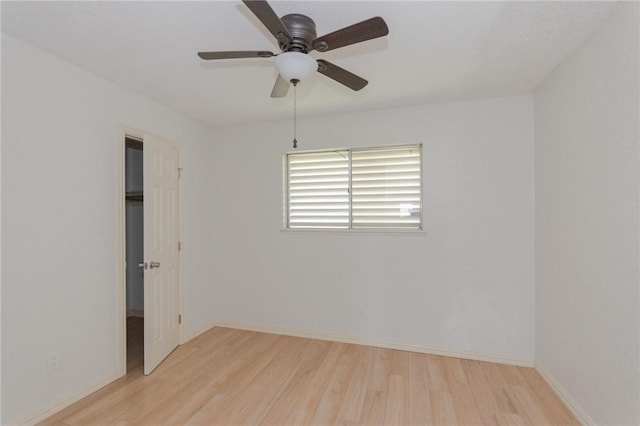 1705 Mermaid Dr, Corpus Christi, TX 78412 - unfurnished bedroom with light wood-style floors, baseboards, and ceiling fan