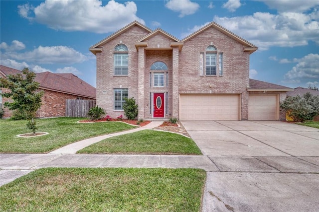 view of front facade featuring a front lawn and a garage