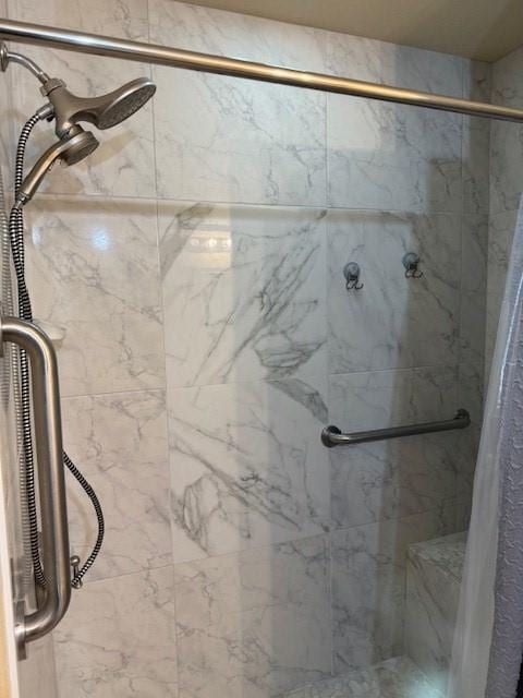 1002 Blue Crest Ln, Beeville, TX 78102 - full bath with a marble finish shower