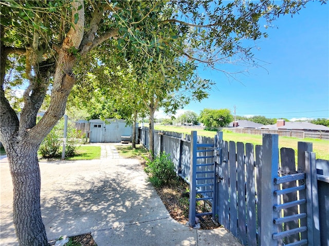 exterior space with a storage shed