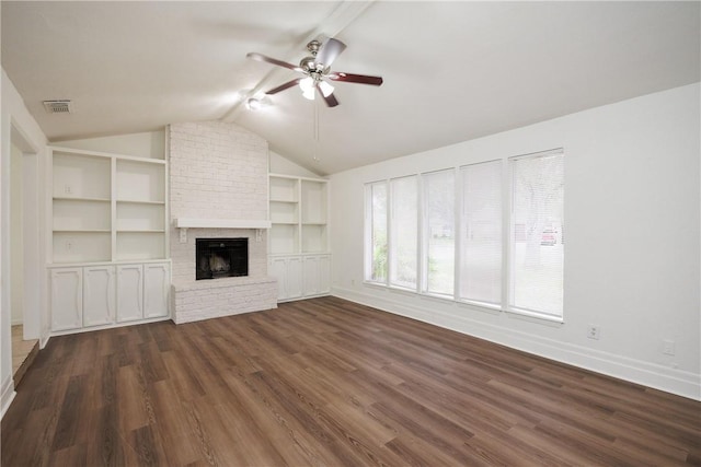 unfurnished living room with visible vents, a ceiling fan, dark wood-style flooring, and vaulted ceiling