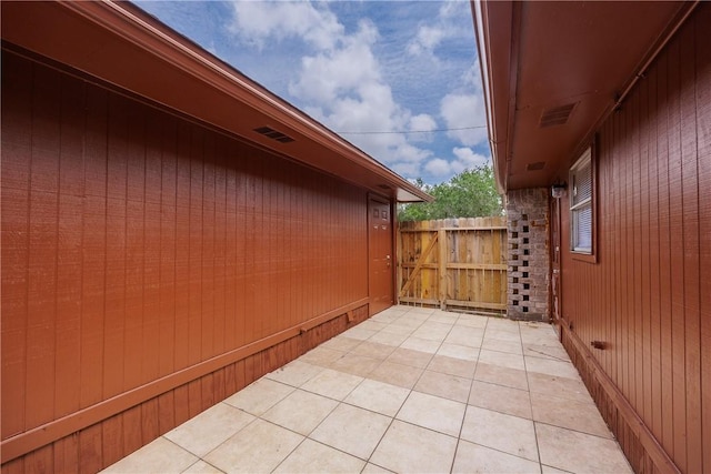 exterior space featuring fence and a patio
