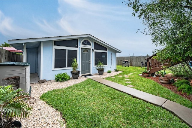view of front of property featuring stucco siding