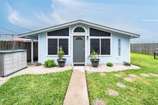 view of front of property featuring stucco siding