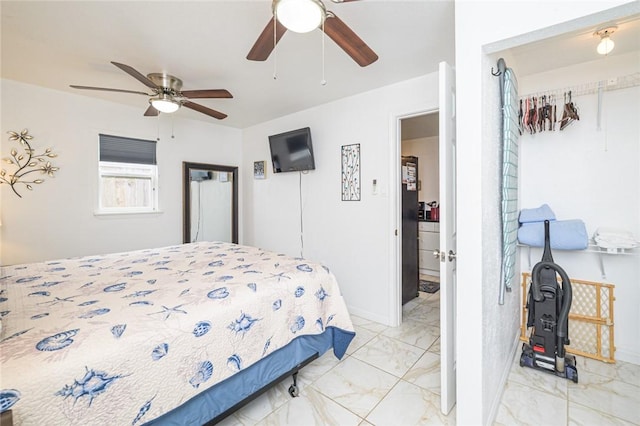 bedroom with light marble finish flooring and a ceiling fan