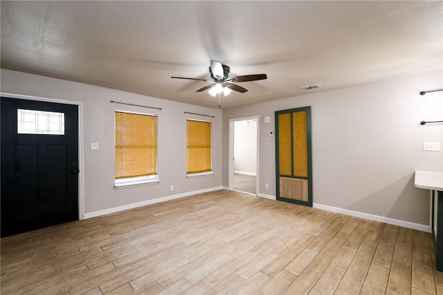 entrance foyer featuring ceiling fan and light wood-type flooring