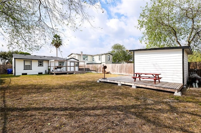 view of yard with a wooden deck