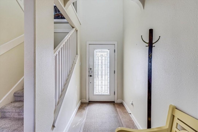 403 Marina Dr, Port Aransas, TX 78373 - foyer featuring stairs and baseboards
