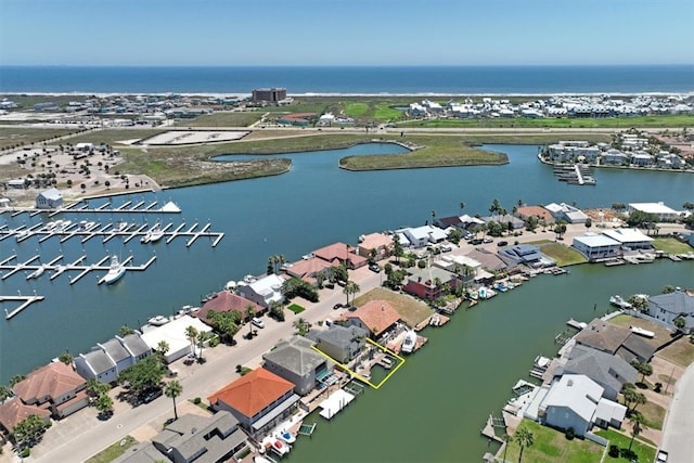 drone / aerial view with a water view