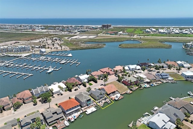 drone / aerial view with a water view