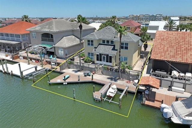 403 Marina Dr, Port Aransas, TX 78373 - dock with a water view and a residential view