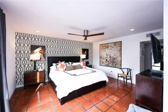 bedroom featuring tile patterned floors and ceiling fan