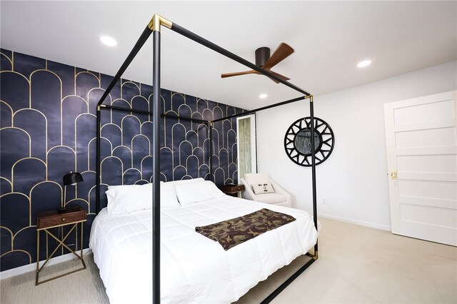 carpeted bedroom featuring ceiling fan