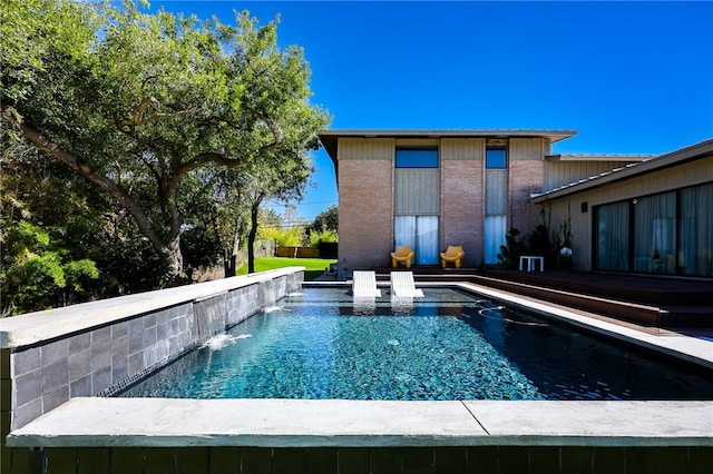 view of pool featuring pool water feature