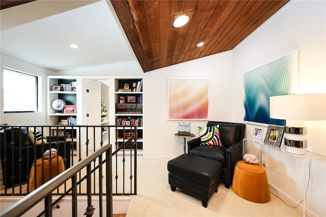 living area featuring wooden ceiling, built in features, lofted ceiling, and carpet