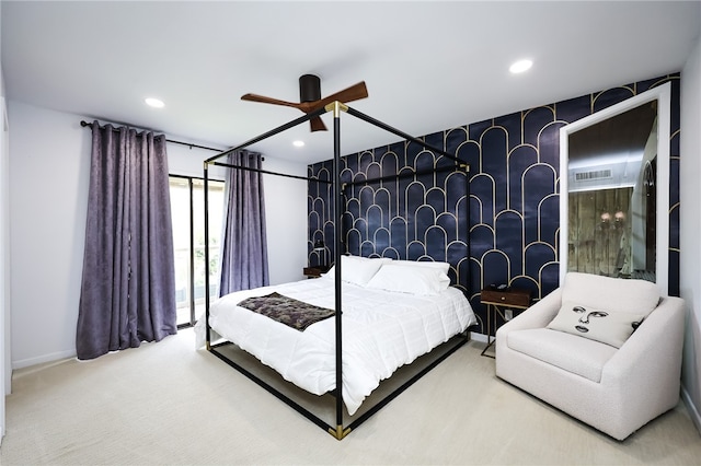 carpeted bedroom featuring ceiling fan and access to outside