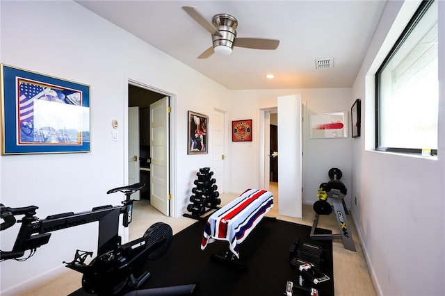 225 Chenoweth Dr, Corpus Christi, TX 78404 - workout area featuring a ceiling fan, light colored carpet, and baseboards