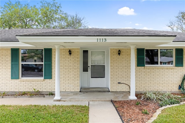 entrance to property with a porch